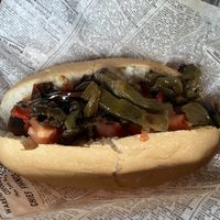 Italian sausage with sweet peppers and tomatoes at Links N Hops in Los Angeles