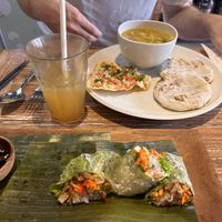 Tasty fresh spring rolls and curry in the back  at Bodhi Leaf Eatery in Denpasar