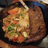 steak in a pan at Four One Six (416) in Tel Aviv