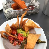 polenta fries and black bean hummus at Four One Six (416) in Tel Aviv