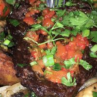 steak in a pan at Four One Six (416) in Tel Aviv