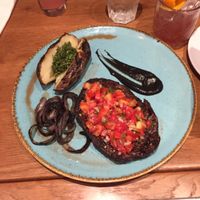 ";New style steak"; with accoutrements  at Four One Six (416) in Tel Aviv