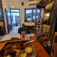 Rear dining area and patio outside. Patio was full of smokers so that meant, with the door kept open, indoor diners get to breathe-in cigarette smoke with their meals. (Vegan and s at Balans Bistro in Bratislava