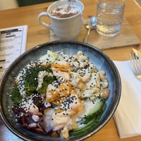 One of the bowls and a dirty chai latte.   at Balans Bistro in Bratislava