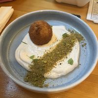 Their fried sweet ball with “Nutella” inside and a lemon mascarpone cream sprinkled with pistachios    at Balans Bistro in Bratislava