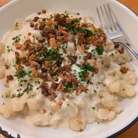 Slovakian traditional dish - gnocchi with bacon bits at Balans Bistro in Bratislava