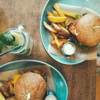 Mexican and balans burgers with French fries, dip and homemade lemonade at Balans Bistro in Bratislava