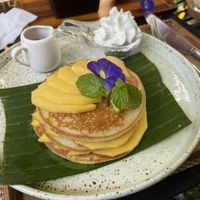 Homemade gluten-free pancakes with mango, 150 baht  at Reform Kafe in Chiang Mai