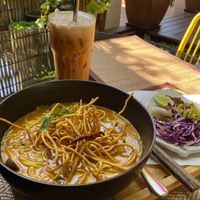 Khao soi with Thai tea   at Reform Kafe in Chiang Mai