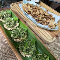 rice cakes with pesto and mushroom, and fried mushrooms  at Reform Kafe in Chiang Mai
