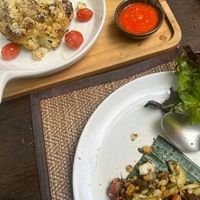 Yummy tea leave salad and cauliflower 💚  at Reform Kafe in Chiang Mai