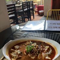Tom Yam with mushroom dumplings   at Reform Kafe in Chiang Mai