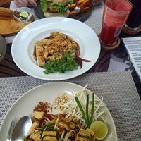 Pad Thai, tofu with tamarind sauce, mushroom burger with chips and salad at Reform Kafe in Chiang Mai