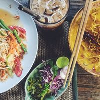 Som tam and Khao Soi soup at Reform Kafe in Chiang Mai
