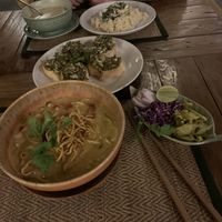 Northern Thai Spicy Noodle Soup, green curry, pesto mushroom bruschetta  at Reform Kafe in Chiang Mai
