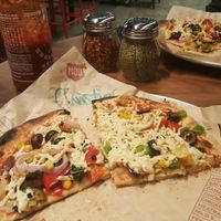 Toppings are under the cheeze at Mod Pizza in Eugene