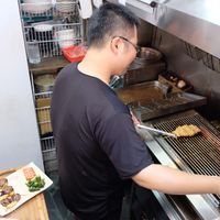 staff preparing grilled veggies  at Lǜ ShíDài 綠時代 - Green Age in Kaohsiung
