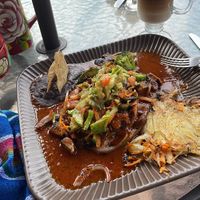 Vegan rancheros and an almond milk capuccino  at Amparos in Cozumel