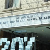 Sign outside storefront at The Imperative in Toronto