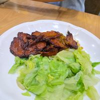 update: this is so good! bbq 'pork' (vegetarian mock pork) in grapefruit sauce. the sauce is very balanced. candied grapefruit peel so yum at Tung Fong Siu Kee Yuen 東方小祇園 in Hong Kong Island