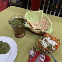 Saag aloo, roti and chana masala - the saag aloo and the bread were okay, but the chana masala was absolutely delicious! at Ganesh Indian Restaurant in Nha Trang