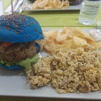 *special* smurf burger quinoa patty with pesto sides are chips and couscous (sweet potato & zucchini) at Vegana Burgers - Cais do Sodre in Lisbon