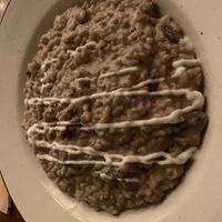 mushroom risotto  at Birdsong Organic Cafe Shop in Mumbai