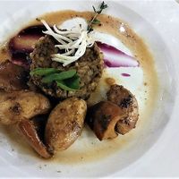 Lentils ''Moutzientra''
Rich ,flavourful, saucy lentils with copped vegetables on a
red cabbage pure, served with local forest mushrooms
stew and baby potatoes ''antinaxtes''. at O'Vrakas Taverna in Limassol