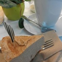 cake with hot chocolate and cream at Vegansuper and Snack Bar in Groningen