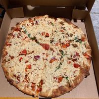 Create your own pizza with extra cheese, veggies, half pepperoni and half beyond beef crumbles.  at Panago Pizza in Regina