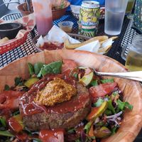 Lentil burger salad with homemade mustard. at Brews Brothers in Galveston
