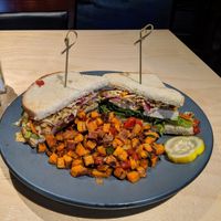 Tofu and Asian slaw sandwich with sweet potato hash! at Roots in Rutland