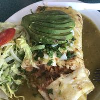 Vegan smothered burrito- tortilla, rice, beans, lettuce, avocado, tomatoes, smothered in verde sauce. It was excellent and all vegan! The owner is very knowledgeable about what products are and aren’t vegan.  at Morenita's in Idaho Falls