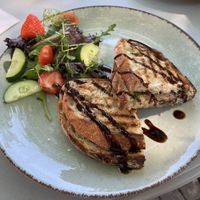 Grilled sourdough sandwich with mushrooms and truffle oil and a side salad   at Cafe Miro in Kristianstad