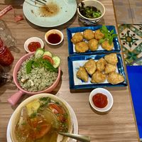 Sour soup, white elm fried rice, crispy silken tofu, fried sake   at Yen Nha Hang Chay & Yoga in Nha Trang