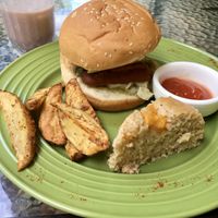Burger with Sausage, Cheese, Pesto, Tomato & Avocado. Strawberry shake. at Natural Spice in Panama City