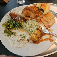 Taken after I'd mostly eaten--onion rings, sweet potato fries, curry wurst, braised celeriac at Tibits - Falkenstrasse in Zurich