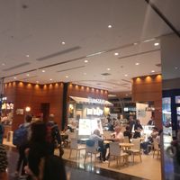 Just past sign for gate 114 at HND - True Soup in Tokyo