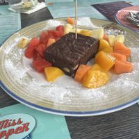 Vegan brownie with fruit  at Miss PeppeR in Barsbuettel