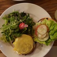 mushroom burger and side salad at Lila in Sarasota