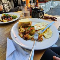 Foreground: vegetarian Rosemary bkfst, background: vegan Papas Loco at Orphan Breakfast House in Sacramento