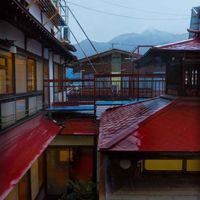 View from a guest room overlooking the Japanese style court yard and one of the bathhouses.  at Yudanaka Seifuso in Yamanouchi