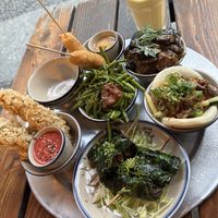 Various delicious small bowls and a mango/coconut drink  at 1990 Vegan Living in Berlin