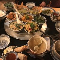 Sharing small dishes with friends at 1990 Vegan Living in Berlin