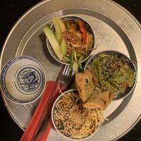 Papaya salad, guacamole & wantan, mixed vegetables and homemade tempeh at 1990 Vegan Living in Berlin