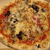 Vegan Italian pizza at Casa La Familia in Vilnius