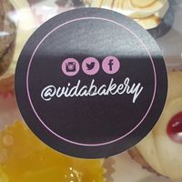 A selection of cupcakes boxed up to takeaway  at VIDA Bakery - Online in East London