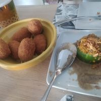 Ración de croquetas veganas y un calabacín relleno at El Almirez in Aranjuez
