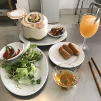 brown rice with coconut, spring roll and orange juice at Com Chay - Nguyen Du in Da Nang