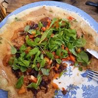 "Create your own" peanut butter, sweet chilli sauce, caremelised onion, peppers & some of the side salad on top at Double Dutch Pancake House in York